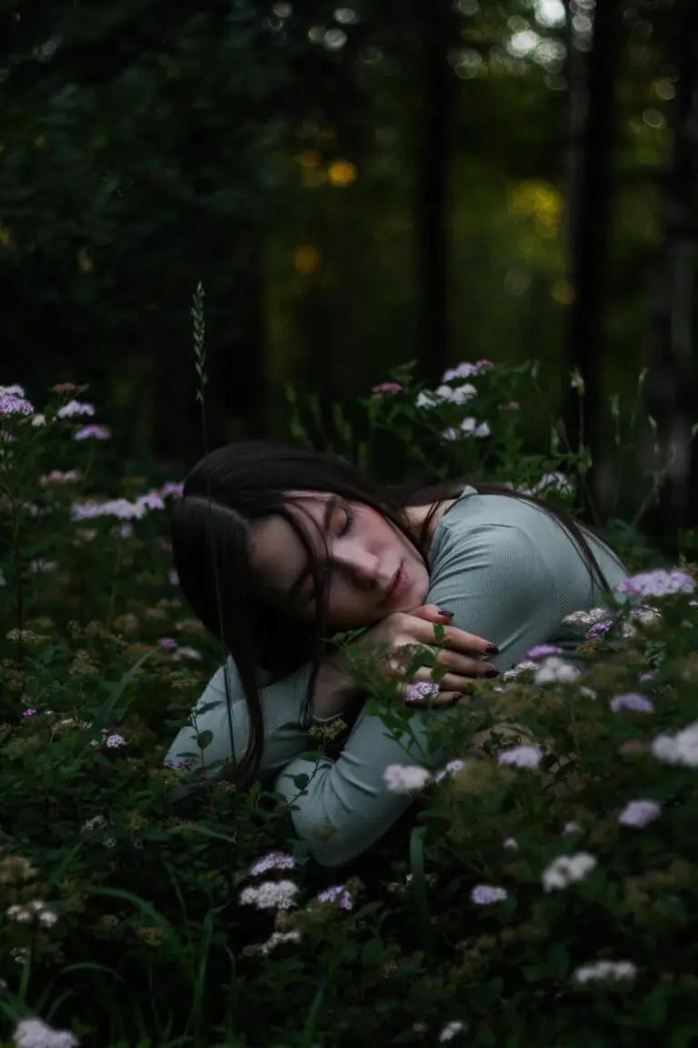 sempervivum death bloom, a young woman amidst blooming meadow flowers