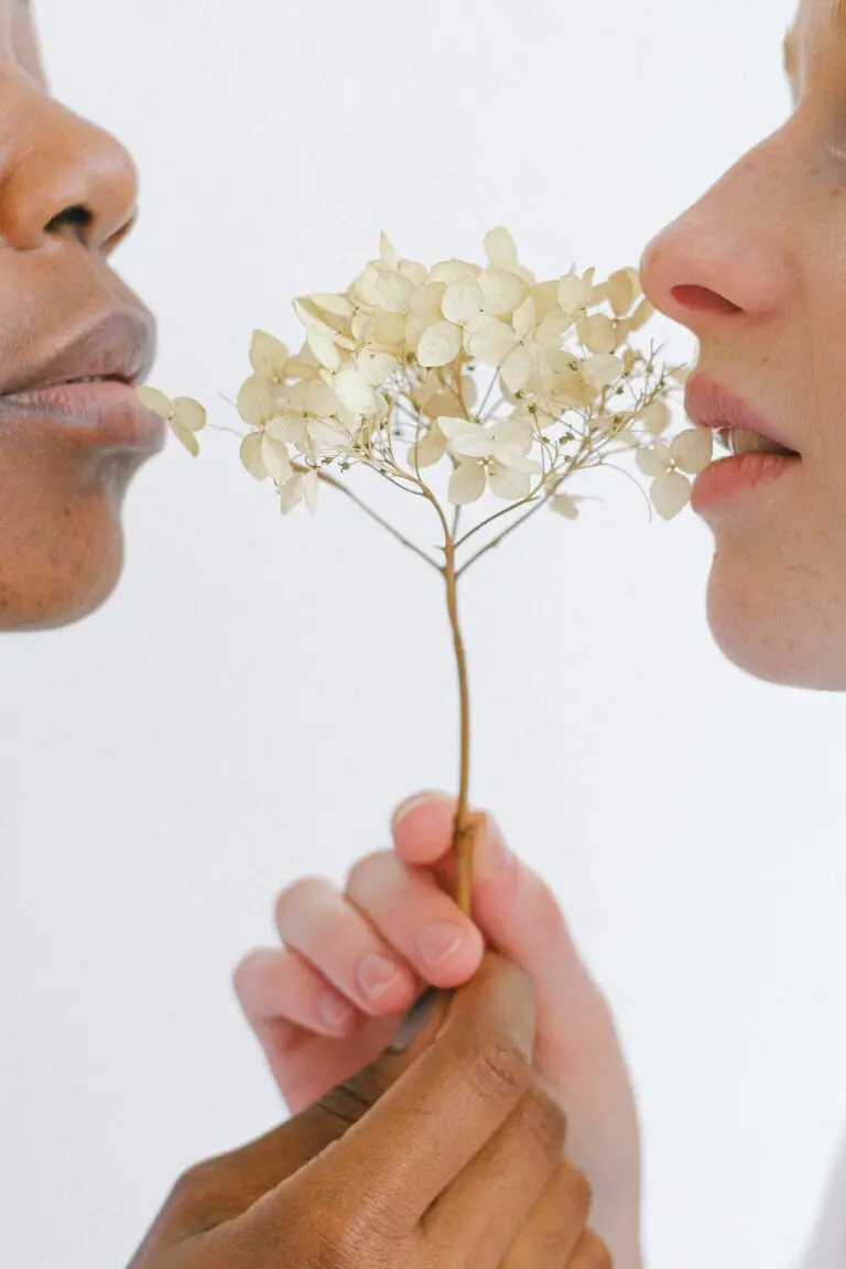 Diversity of CAM plants showing people with succulent flowers close to their lips