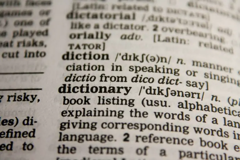 Sedum pronunciation guide illuminated by a dictionary's bokeh effect