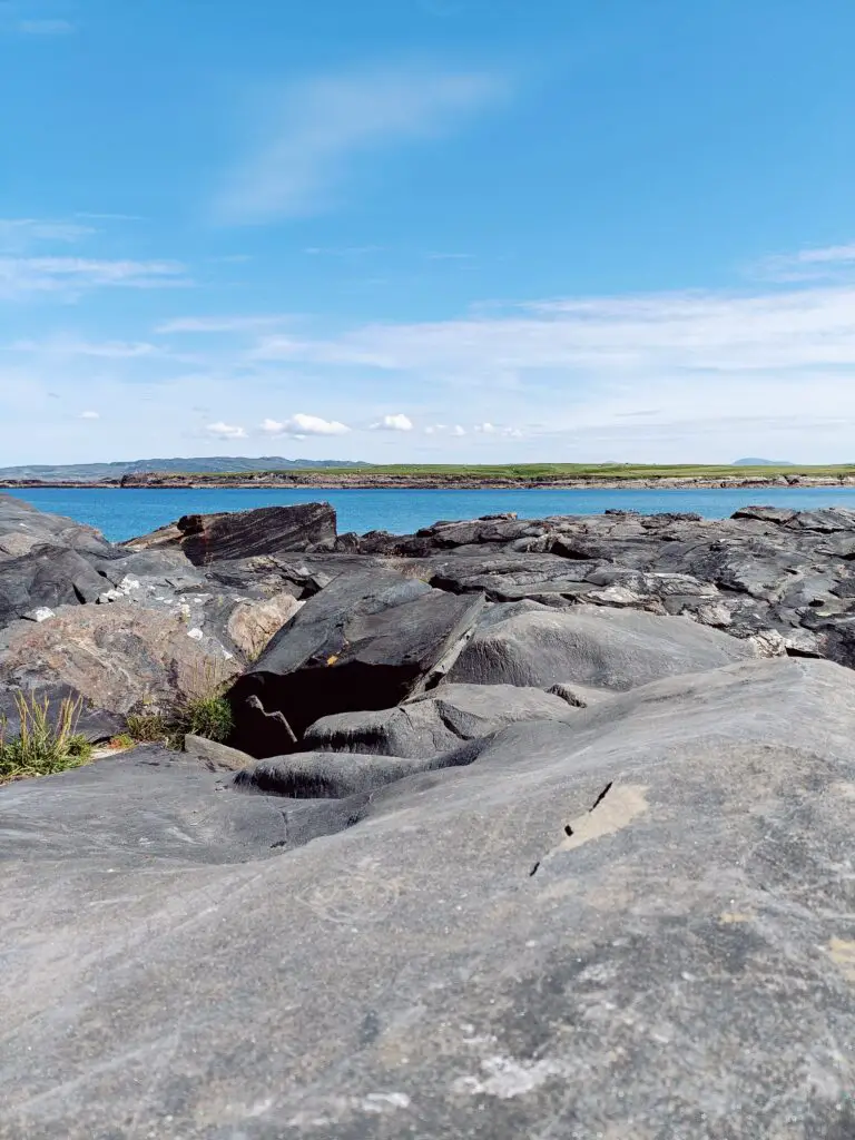 how do sedimentary rocks form - Brown Rock Formation on Seashore