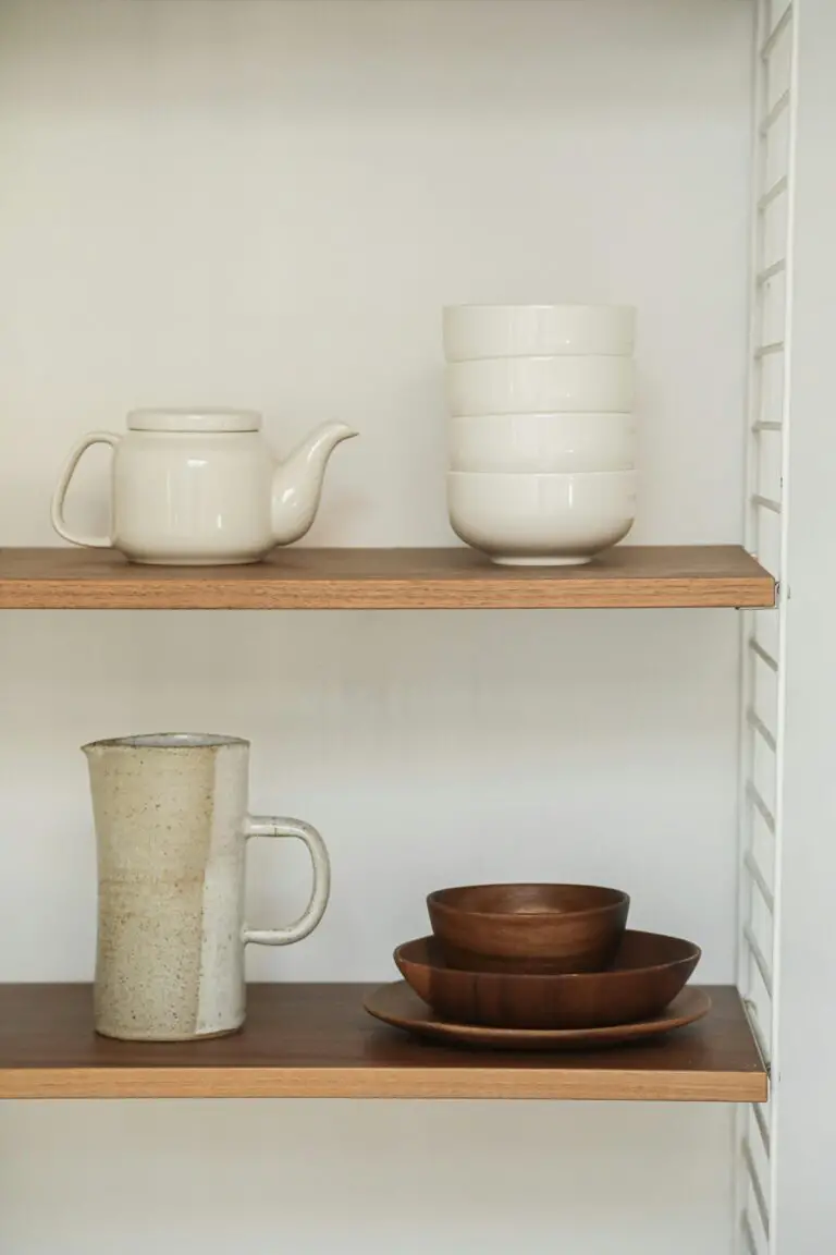 Sedum thriving in containers on wooden shelves